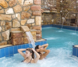 Turn Your Light Retreat at 9 Queens Spa Hotel Two Women enjoying the Thermal Spa Pool